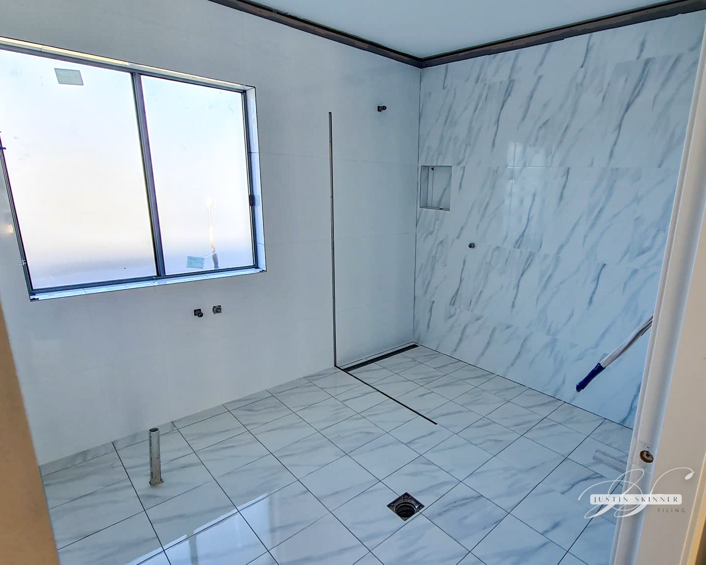 Creating a Timeless Bathroom with Marble-Look Tiles